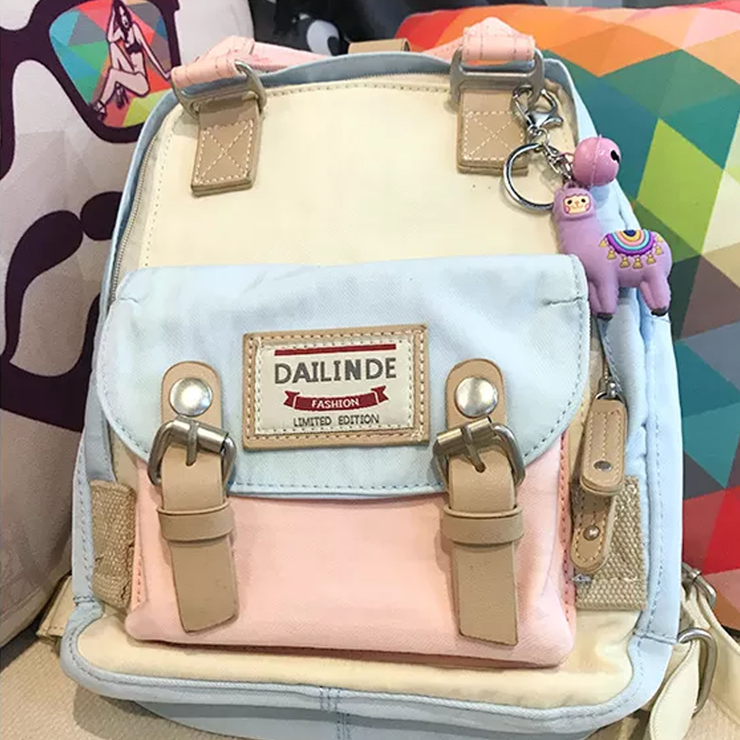 Lama keychain with bell hanging on a bag