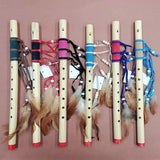 Bamboo Flutes with Feathers & Leather