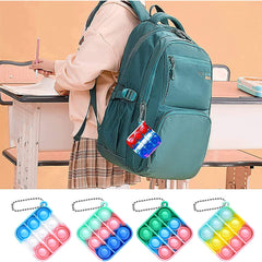 tie dye mini square pop it fidget toy keychains hanging on bag