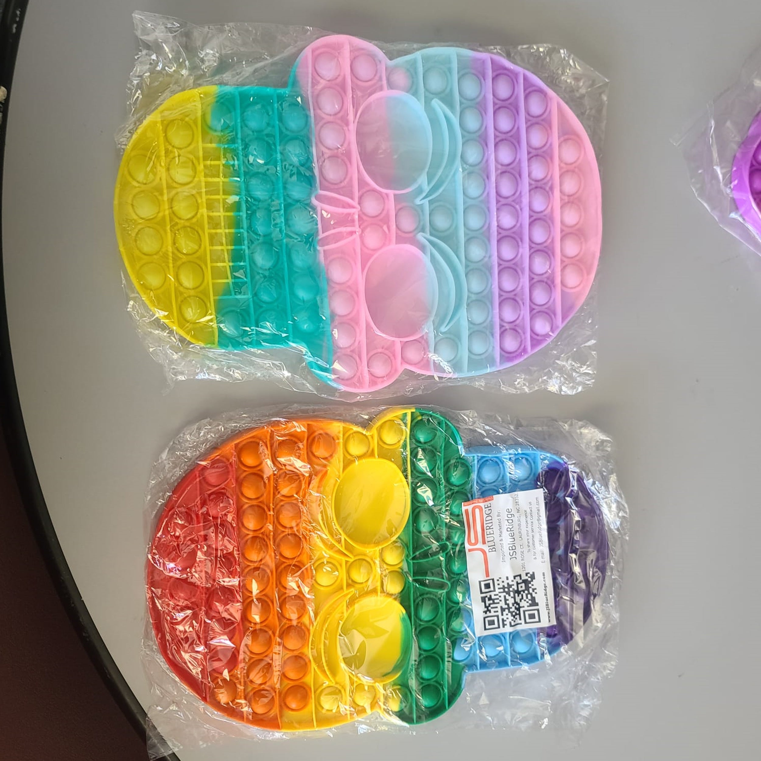 Packing Image Of Rainbow Skull Pop It Fidget Toy