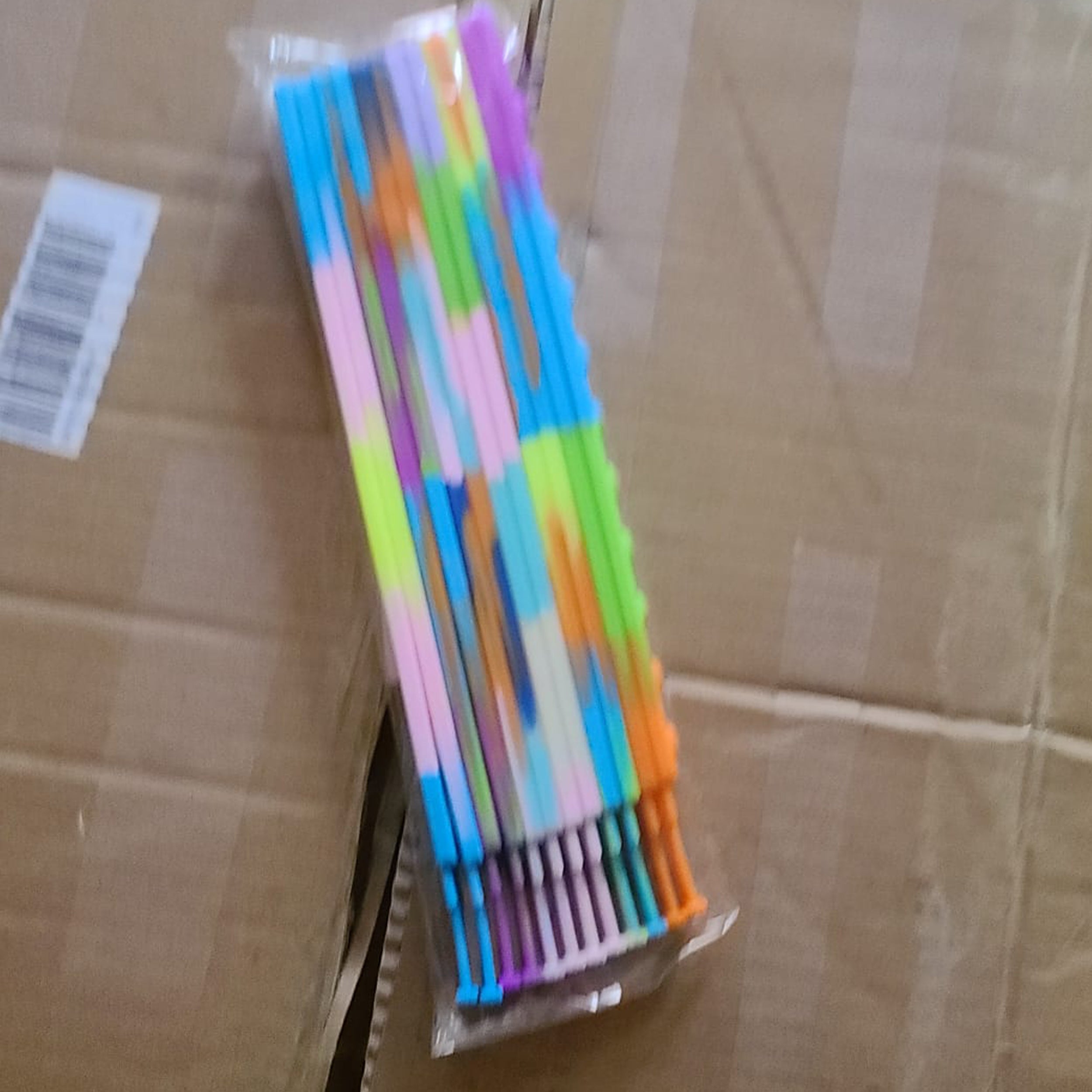 Packing Image Of Wrist Band Pop Toy