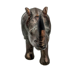 Dark Wooden Rhinoceros with Stone Artwork