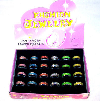 Buy GLITTER BAND RINGS (sold by the dozen *- CLOSEOUT NOW ONLY 25 CENTS EABulk Price